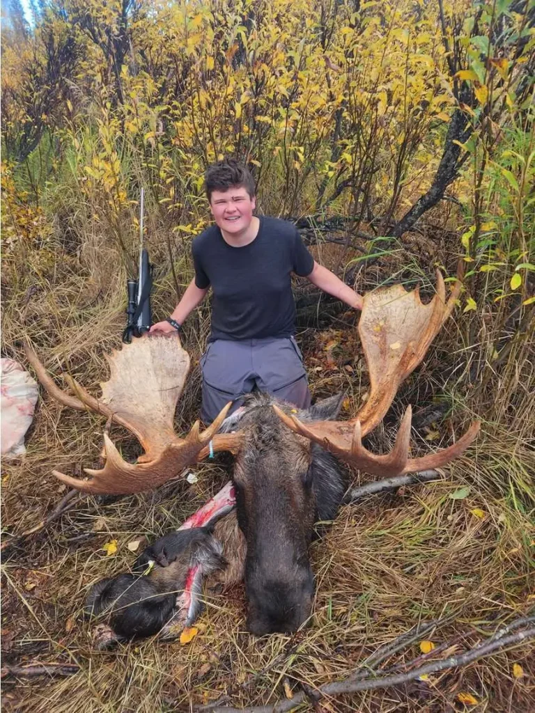 Grandson with his first bull moose, taken on his seventeenth birthday in Alaska