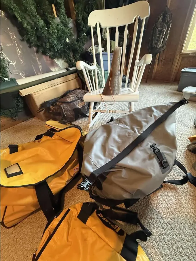 Hunter packing gear for a do-it-yourself Alaska moose hunt